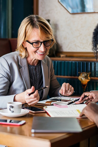 Canadian lawyer reviewing an administrative decision and legal documents for a judicial review application